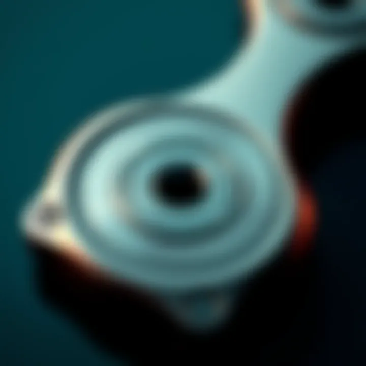 Detailed Look at the Neo Spin Fidget Design Close-up view of a Neo Spin Fidget showing its smooth metallic finish and central bearing